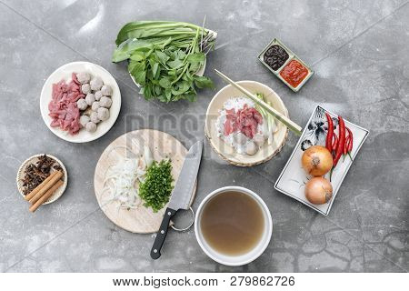 Traditional Vietnamese Soup Pho Bo With Herbs, Meat, Rice Noodles, Broth. Pho Bo In Bowl With Chopst