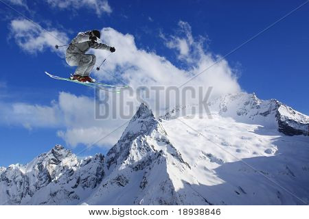 flying skier on mountains