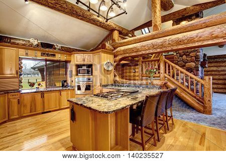 Log Cabin Kitchen Interior Design With Honey Color Cabinets.