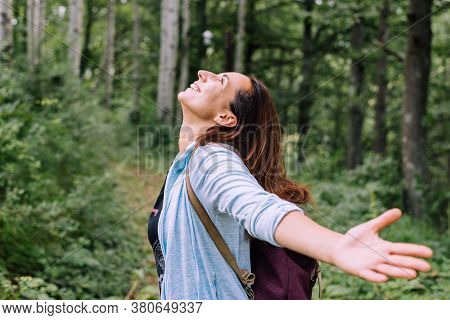 Beautiful Woman Smiling In Nature. Happy People Lifestyle. Woman In Forest Nature. Nature Lifestyle.