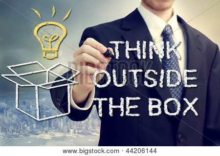 Businessman With Think Oustide The Box