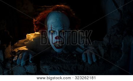 Dnipro, Ukraine - September 8, 2019: Portrait Of A Cosplayer In The Image Of A Pennywise The Dancing