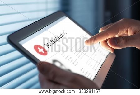 Medical Record In Electronic Form. Digital Emr With Patient Health Care Information. Doctor Using Ta