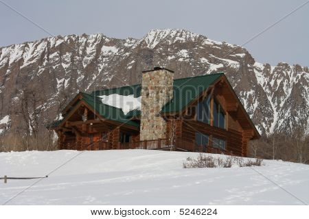 Log Cabin In Snow