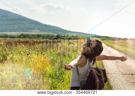 Beautiful Woman Smiling In Nature. Happy People Lifestyle. Woman Smiling In Sunshine. Nature Lifesty