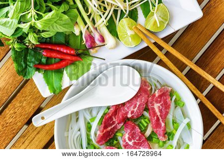 Top View Of The Pho Bo. Popular Beef Noodle Soup Of Vietnam