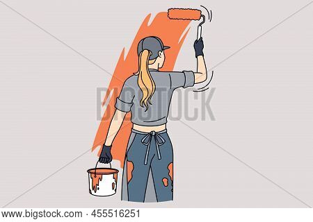 Woman Painting Wall With Roller. Female Worker Or Employee Renovate Room By Herself. Renovation And 