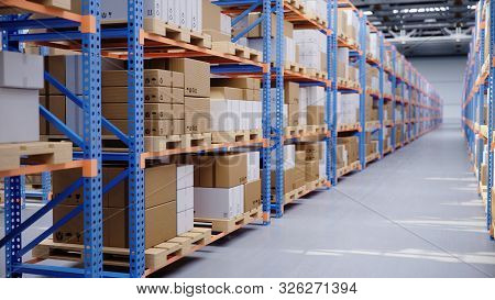 Warehouse With Cardboard Boxes Inside On Pallets Racks, Logistic Center. Huge, Large Modern Warehous