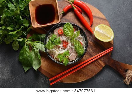 Traditional Vietnamese Soup Pho Bo With Herbs,beef, Rice Noodles,chili And Bean Sprouts . Vietnamese