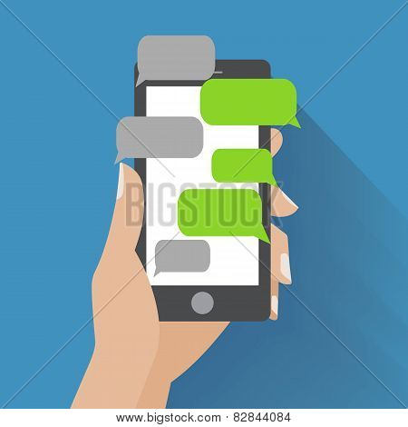 Hand holding smartphone with blank speech bubbles