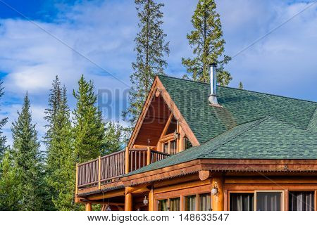 The top of the house or log cabin with nice window.