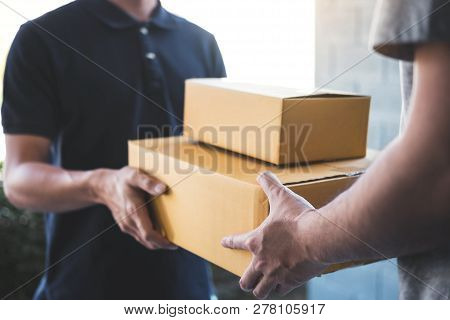 Delivery Mail Man Giving Parcel Box To Recipient, Young Owner Accepting Of Cardboard Boxes Package F