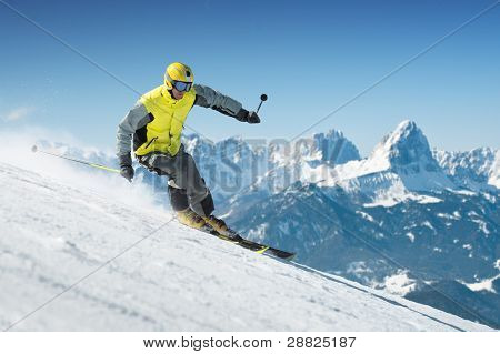 Skier in high mountains