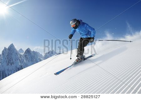 Skier in high mountains - alpine