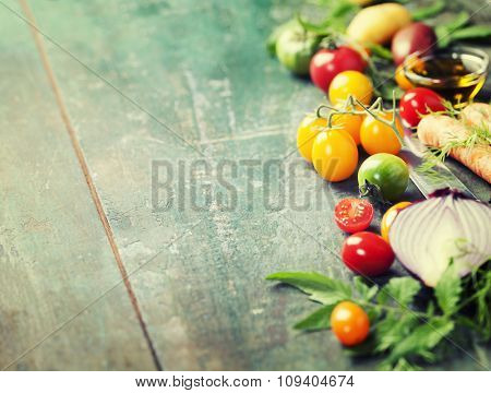 Vegetables on wood. Bio Healthy food, herbs and spices. Organic vegetables on wood. Cooking, Healthy Eating or Vegetarian concept.  Background layout with free text space.