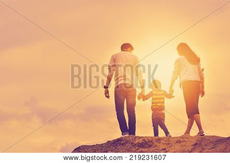 son father mother boy fun love nature vacation happiness young family joy summer sun together outdoors play travel smiling parents walk lifestyle relationship parent active photo happy family positive people relatives recreational activity sky relaxation