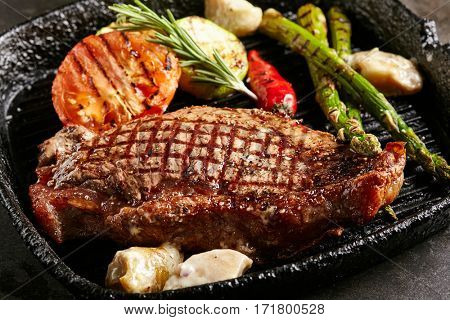 Beef Steak - BBQ Strip Steak (Grilled Beef Strip Loin Steak) with Roast Vegetables and White Sauce