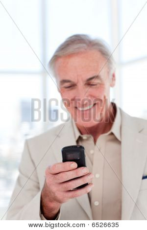 Senior Manager Sending A Text