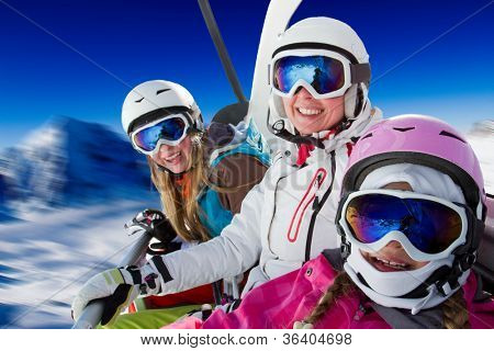 Skiing, ski lift, winter - skiers on ski lift