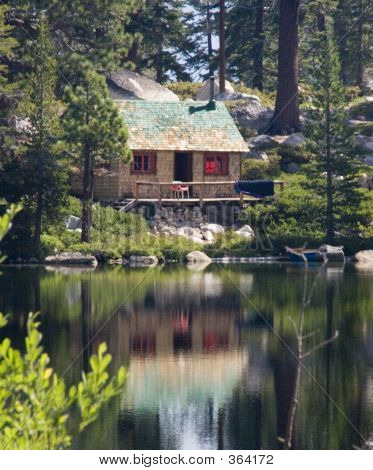 Cabin In The Woods Near Lake