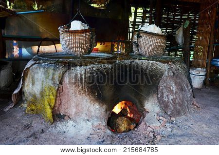 Thai People Use Ancient Old Stove For Make Rock Salt At Ban Bo Kluea Village In Nan, Thailand