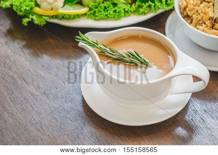 Close up of Gravy sauce on Christmas Dinner table