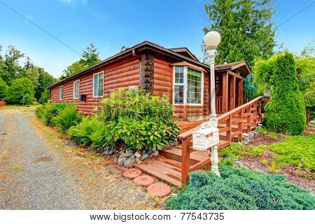 Log Cabin Style House Exterior With Curb Appeal