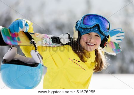 Skiing, skier, winter sports - portrait of happy young skier