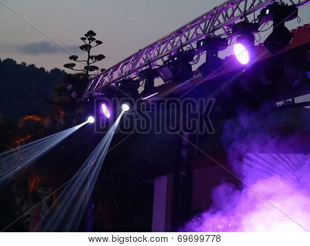 Abstract Blue Bright Spotlights In Open Air Stage