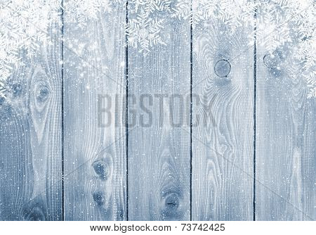 Blue wood texture with snow christmas background