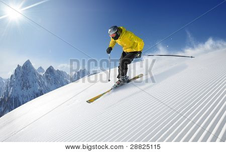 Skier in hight mountains