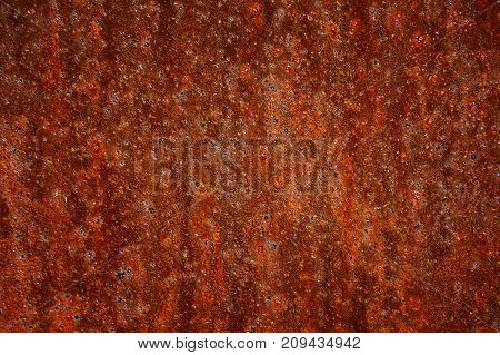 Rusted old iron. Dark background. Abstract background..