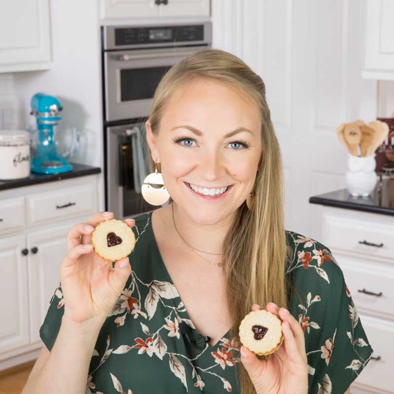 The author (Sam) in blue shirt holding donut